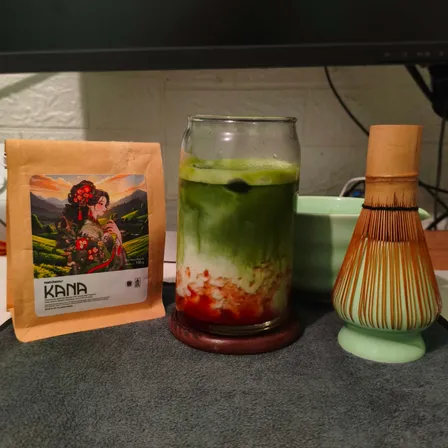 A glass of strawberry matcha latte